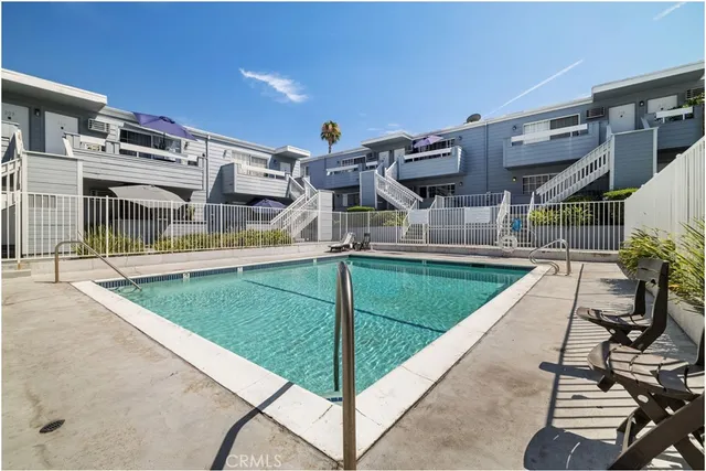a view of a house with swimming pool