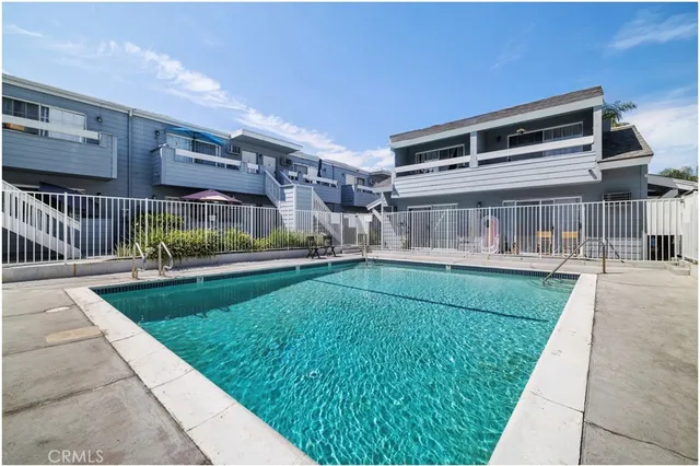 a view of house with a yard