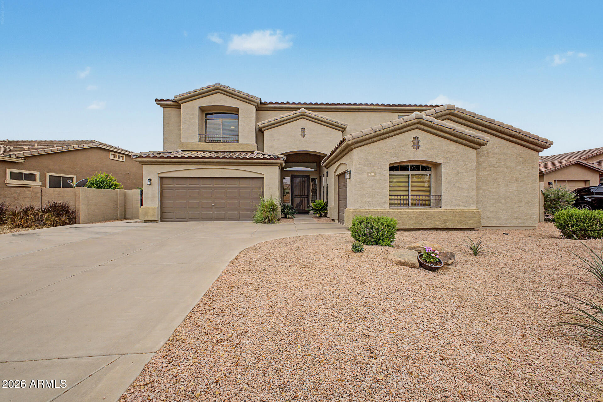 6580 South Agate Way Chandler, AZ 85249 - Photo 1 of 2 a front view of a house with a yard