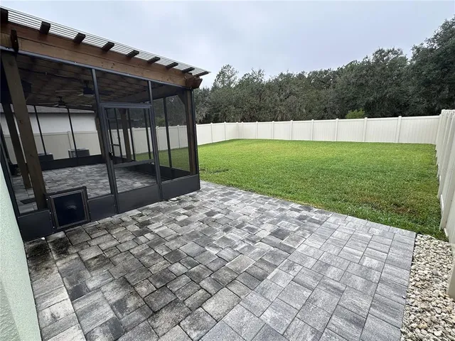 a view of backyard with green space