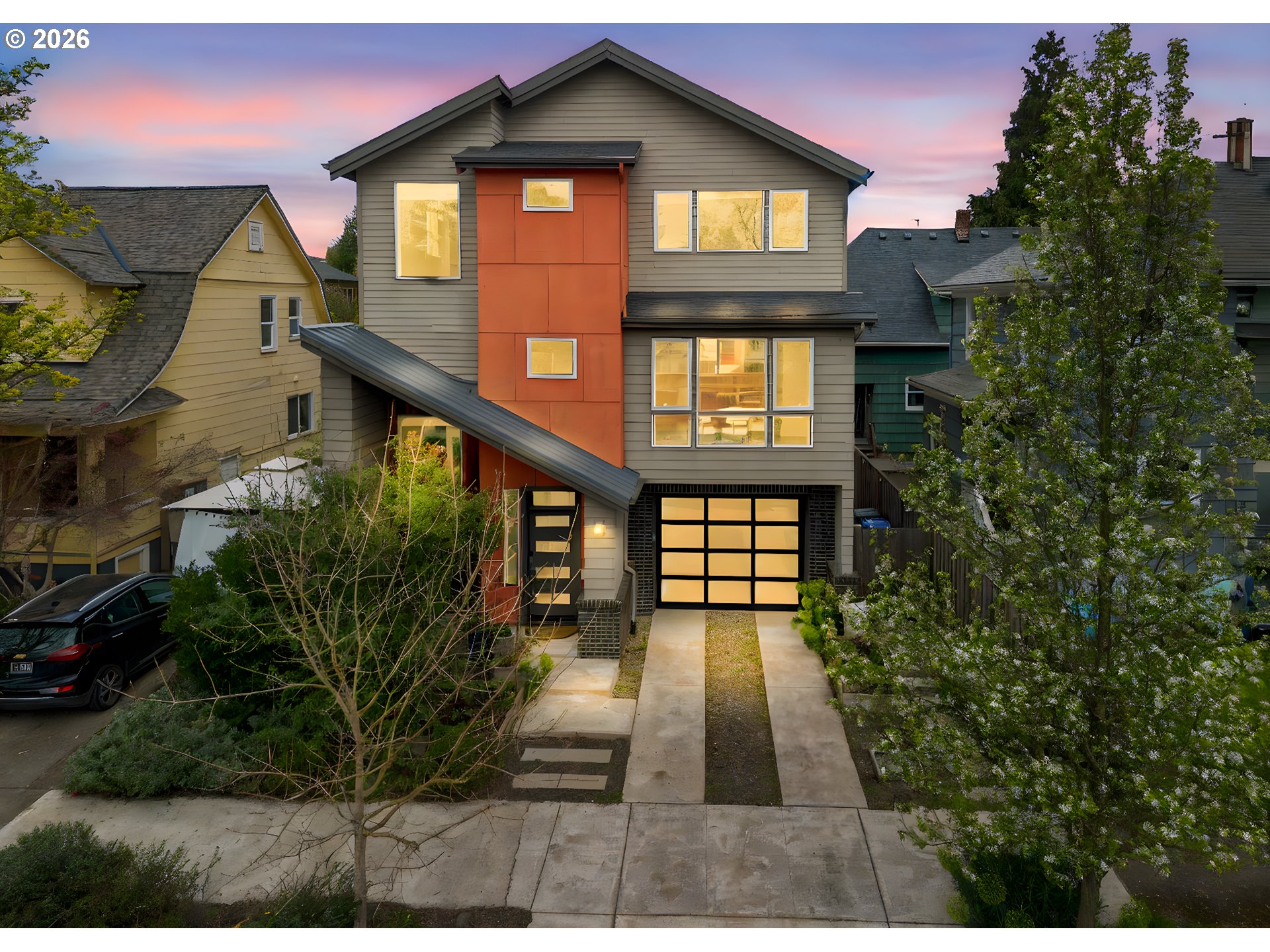 2626 Southeast 16th Avenue Portland, OR 97202 - Photo 1 of 48 a front view of a house with a yard