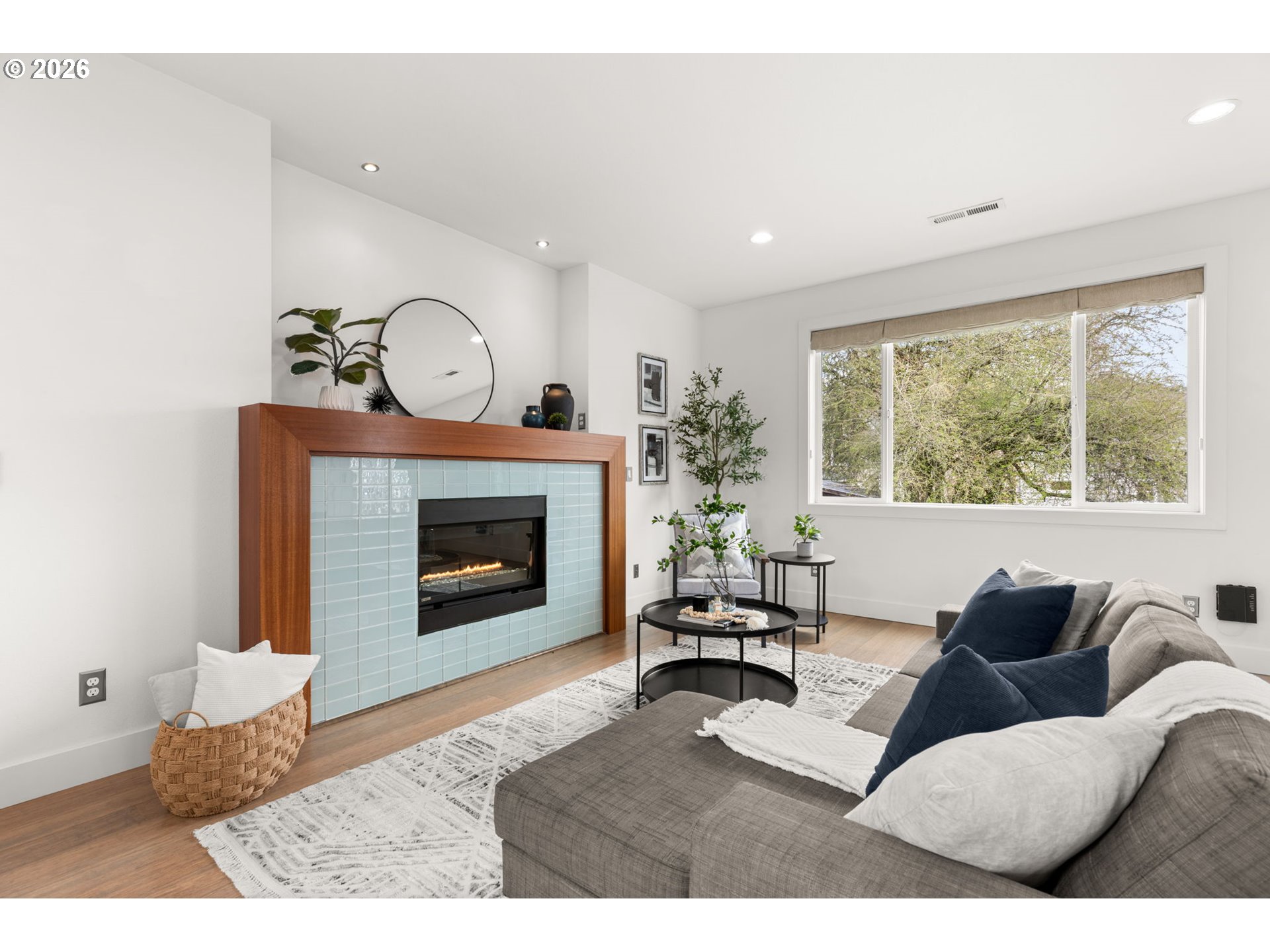 2626 Southeast 16th Avenue Portland, OR 97202 - Photo 12 of 48 a living room with furniture and a fireplace