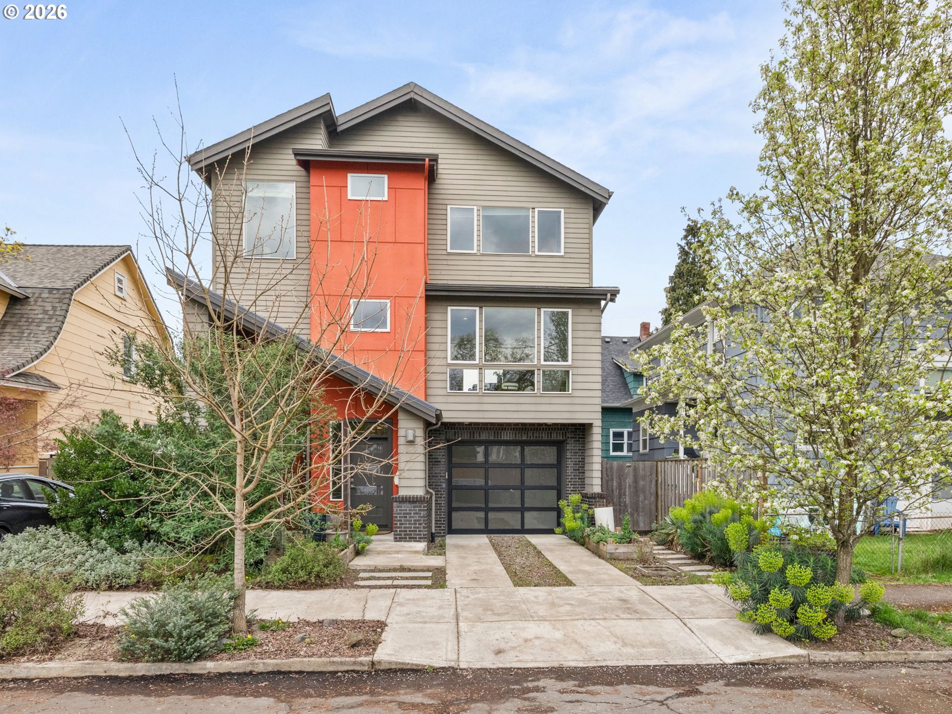 2626 Southeast 16th Avenue Portland, OR 97202 - Photo 2 of 48 a front view of a house with garage