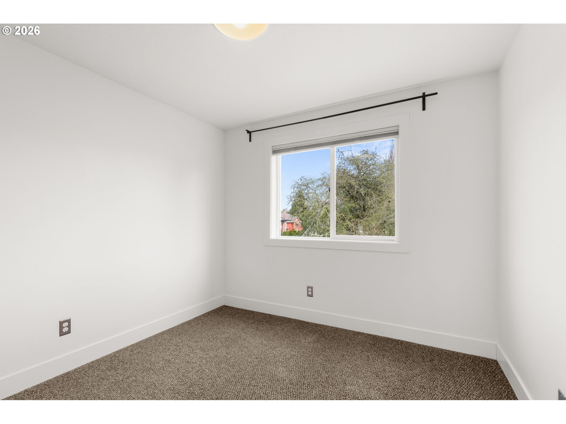 2626 Southeast 16th Avenue Portland, OR 97202 - Photo 39 of 48 an empty room with a window