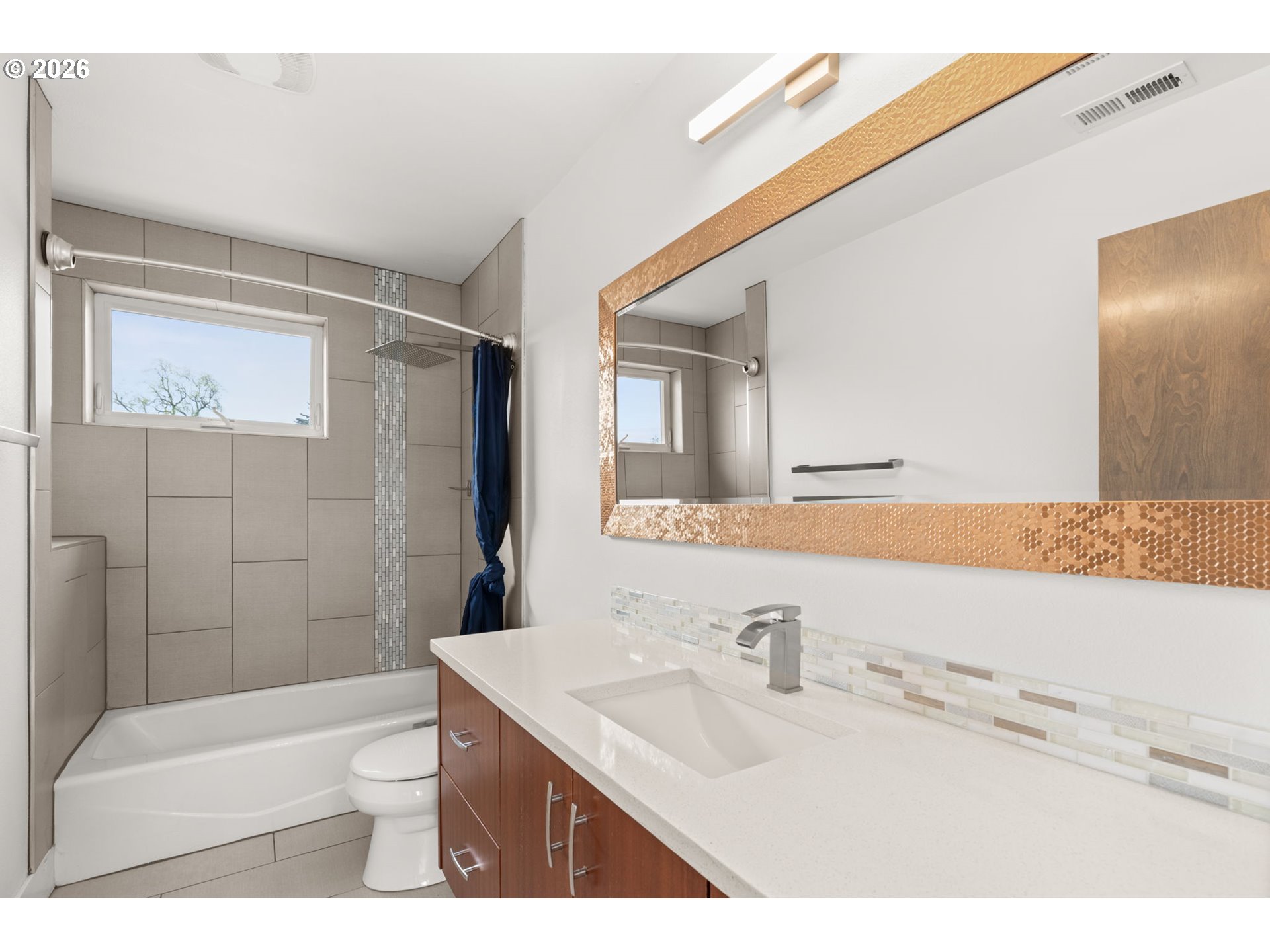 2626 Southeast 16th Avenue Portland, OR 97202 - Photo 41 of 48 a bathroom with a sink a toilet and shower