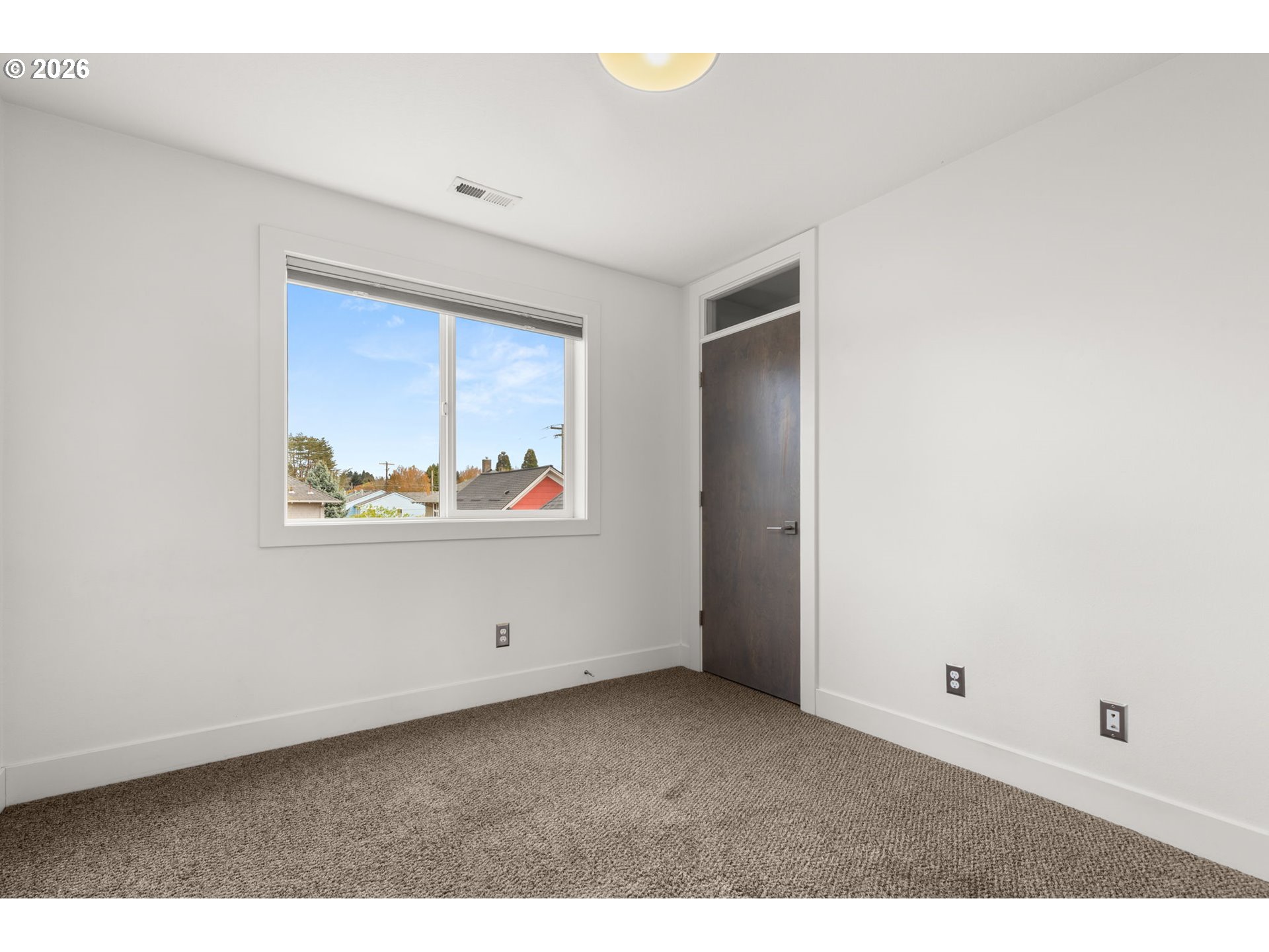 2626 Southeast 16th Avenue Portland, OR 97202 - Photo 43 of 48 a view of an empty room with window
