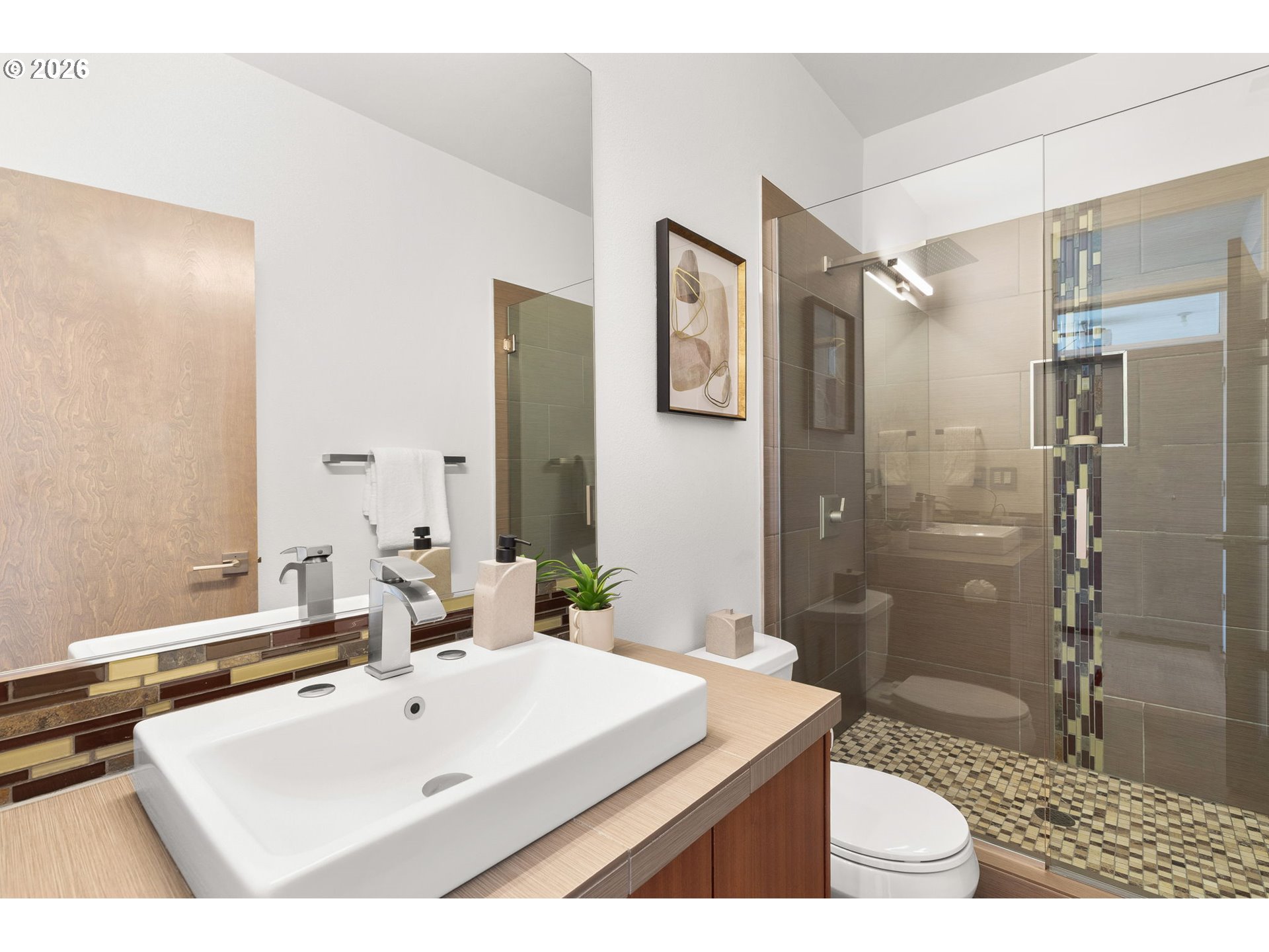 2626 Southeast 16th Avenue Portland, OR 97202 - Photo 8 of 48 a bathroom with a sink and a mirror