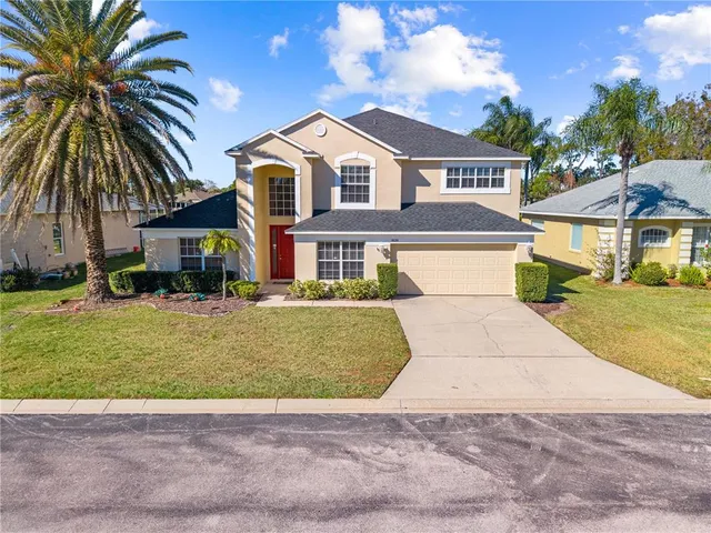 a spacious bathroom with a double vanity sink a mirror and a shower