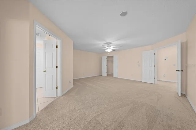 a view of empty room with windows