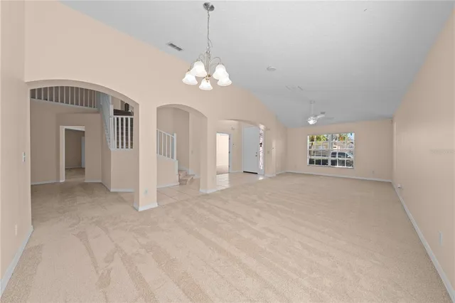 a view of a swimming pool with an outdoor space and seating area