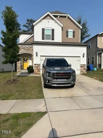a house view with a outdoor space