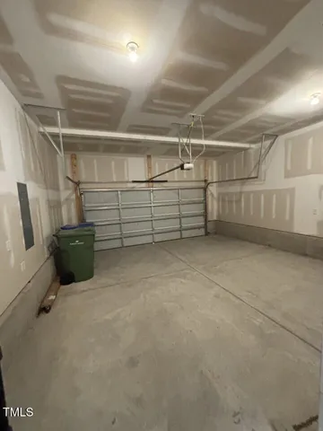 a bathroom with a toilet a sink a mirror and vanity