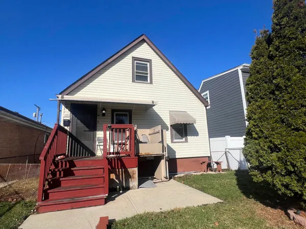 a front view of a house with garage