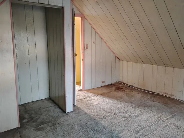 a view of a livingroom with a hallway