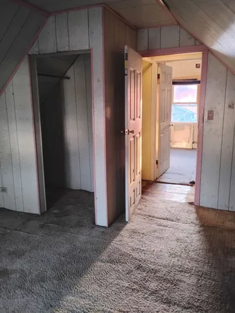 an empty room with closet
