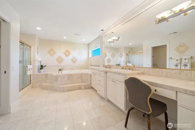 a large white kitchen with a large window