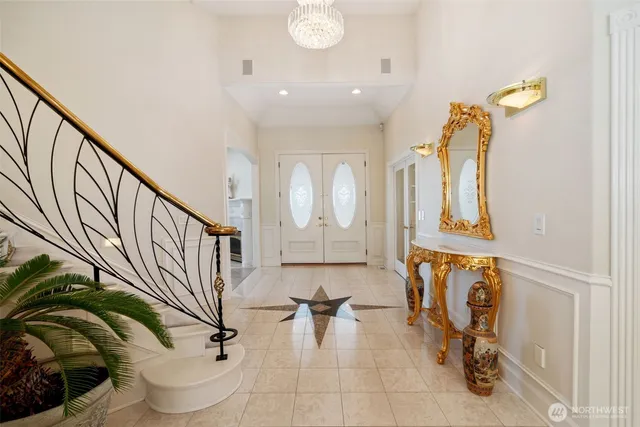 a bathroom with a sink mirror and toilet
