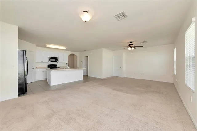 a view of a kitchen with a sink