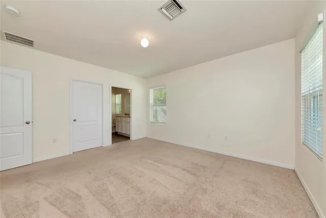 a view of an empty room with window