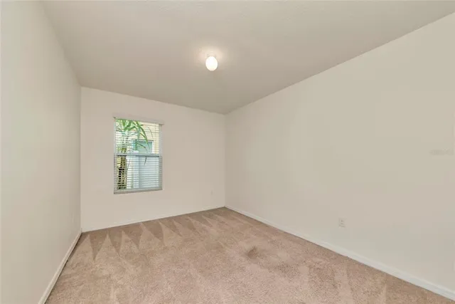 an empty room with a window