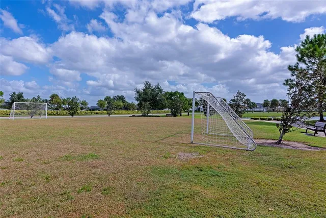 a view of a lake with a park