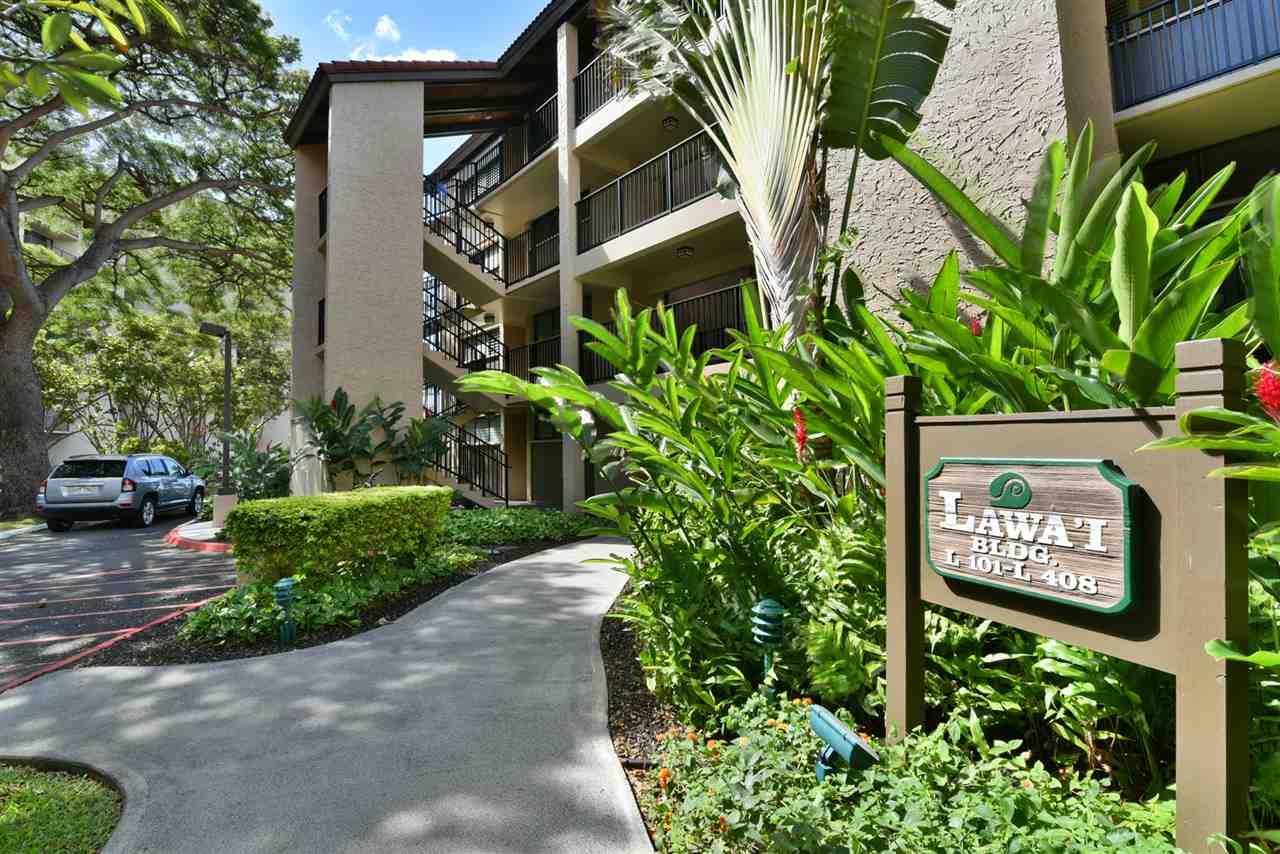 3543 Lower Honoapiilani Road, Unit L302 Lahaina, HI 96761 - Photo 10 of 28 a sign that is next to a road