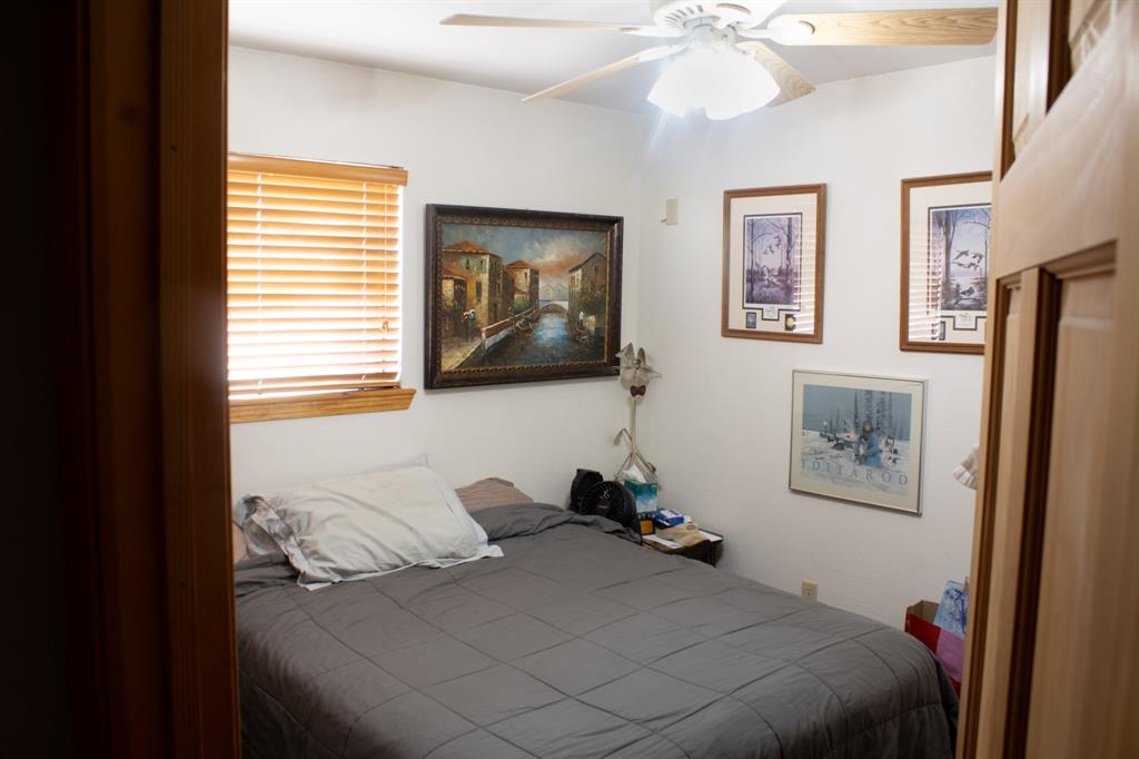 140 Baize Road Abilene, TX 79602 - Photo 20 of 37 Bedroom featuring a ceiling fan