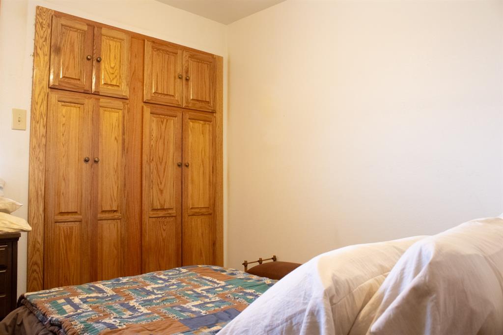 140 Baize Road Abilene, TX 79602 - Photo 27 of 37 Bedroom featuring a closet