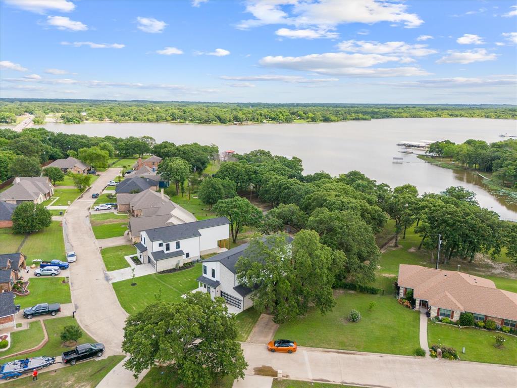 2811 Rodeo Drive Quinlan, TX 75474 - Photo 2 of 35 Aerial view of residential area featuring a nearby body of water