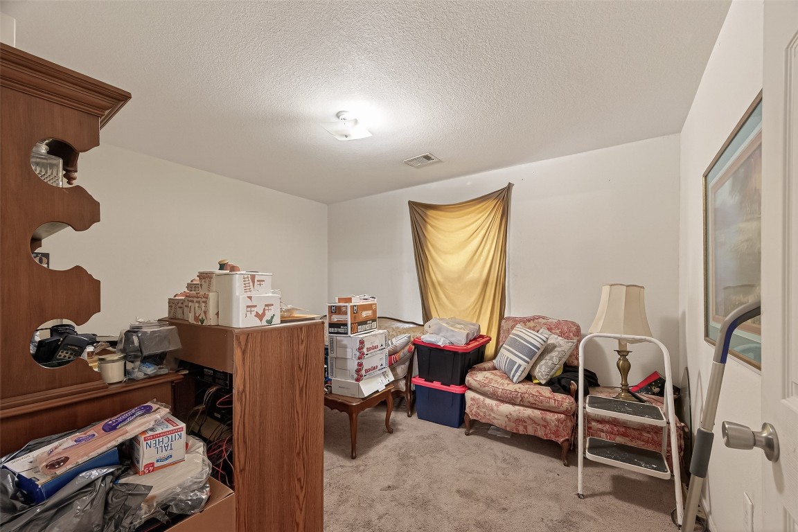 7100 Harlem Street Baytown, TX 77521 - Photo 19 of 30 a living room with furniture and a window