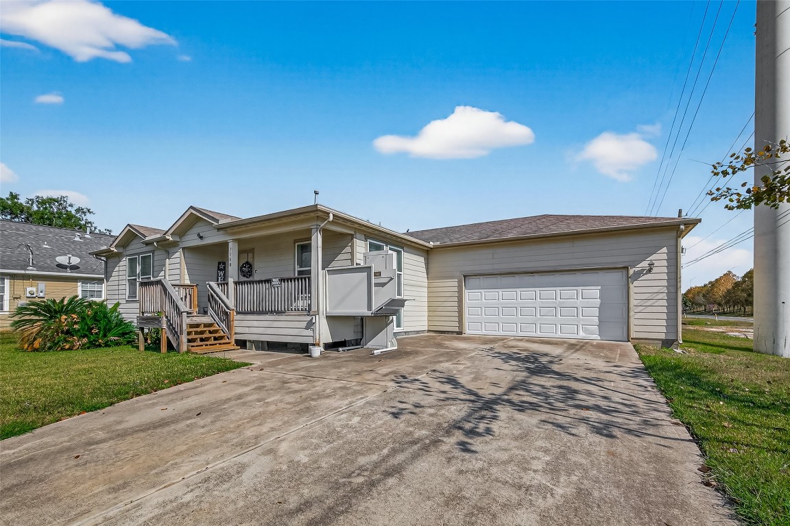 7100 Harlem Street Baytown, TX 77521 - Photo 5 of 30 a view of a house with a yard