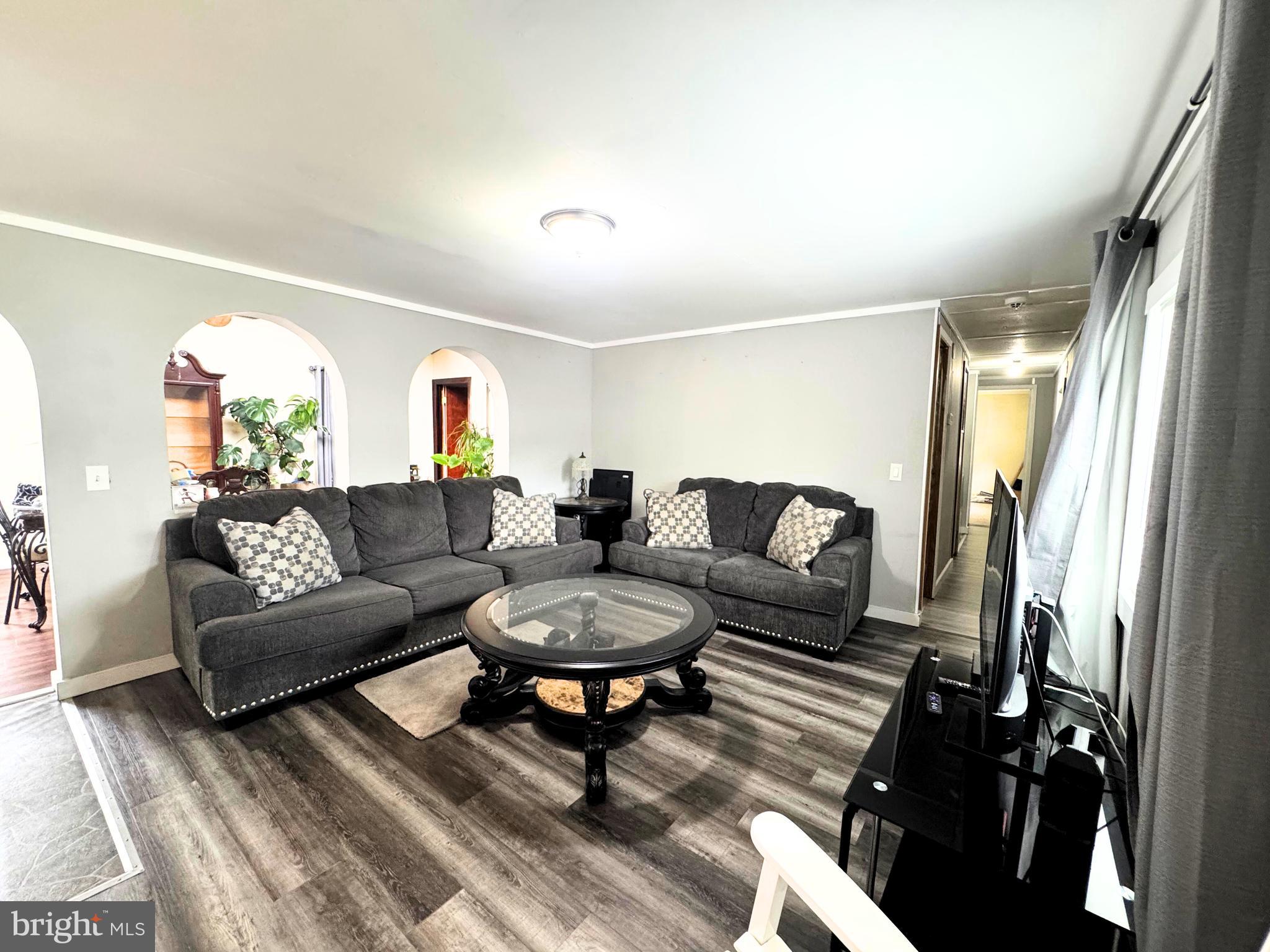 18 Alexander Avenue Jackson, NJ 08527 - Photo 11 of 22 a living room with furniture and a fireplace