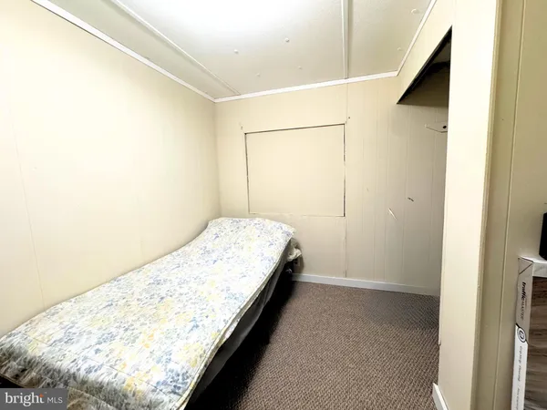 a view of bedroom and bathroom