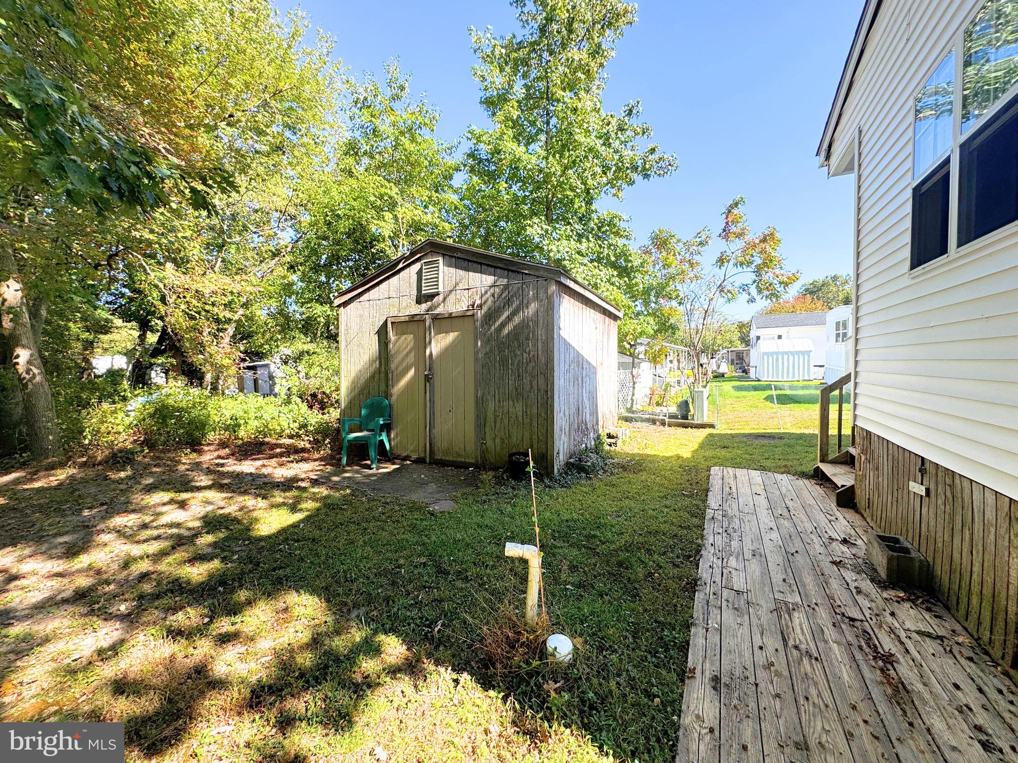 18 Alexander Avenue Jackson, NJ 08527 - Photo 20 of 22 a backyard of a house with lots of green space