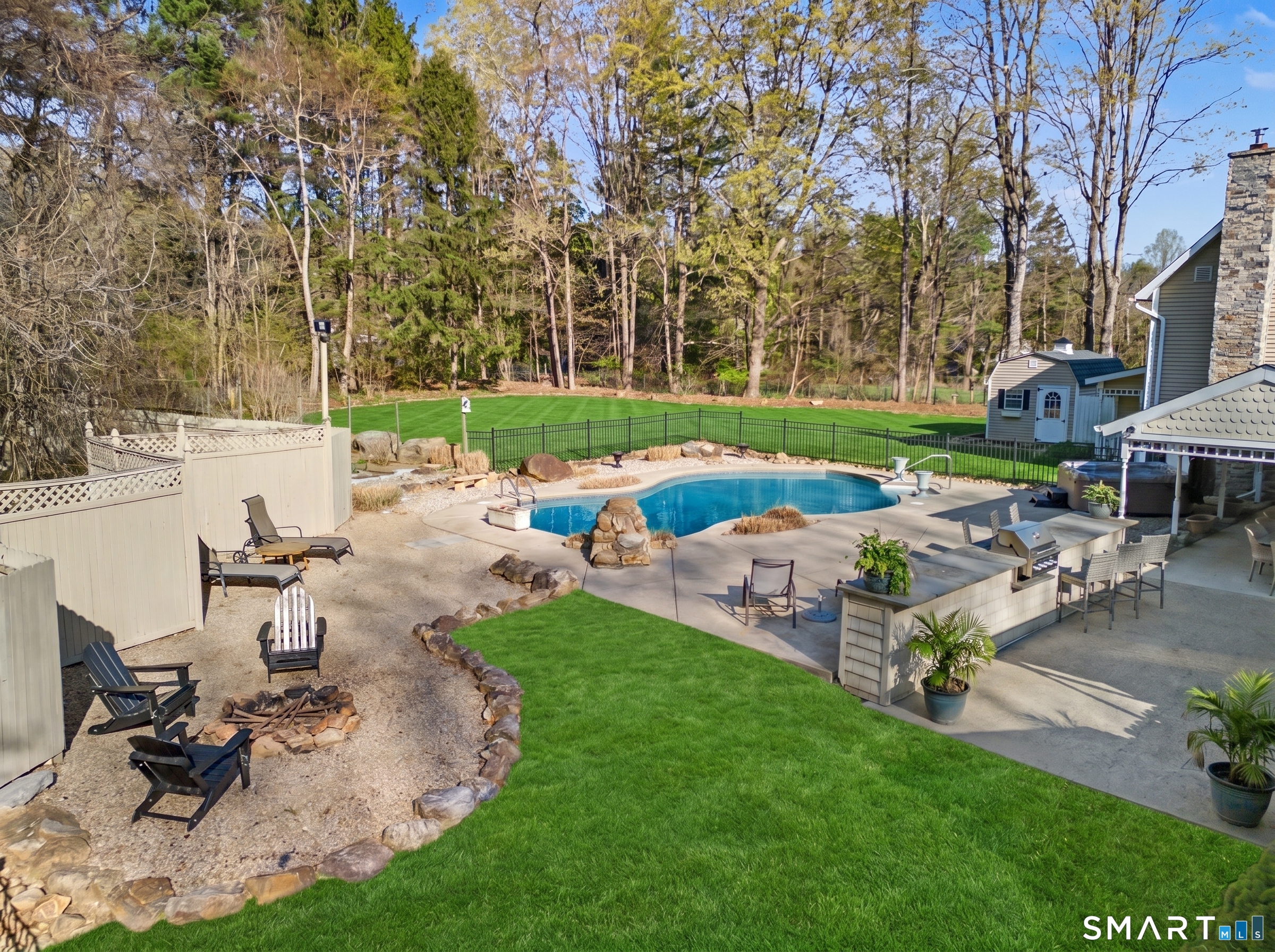 602 Durham Road Madison, CT 06443 - Photo 3 of 34 Outdoor Kitchen and fire pit area