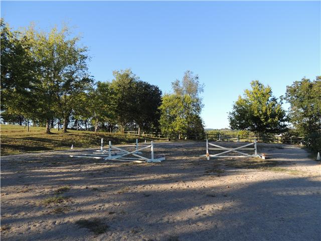 261 Hopkins Road Pulaski, TN 38478 - Photo 9 of 14 Enclosed, all-weather surfaced riding ring with electricity. Working well on barn side of farm in addition to city water.