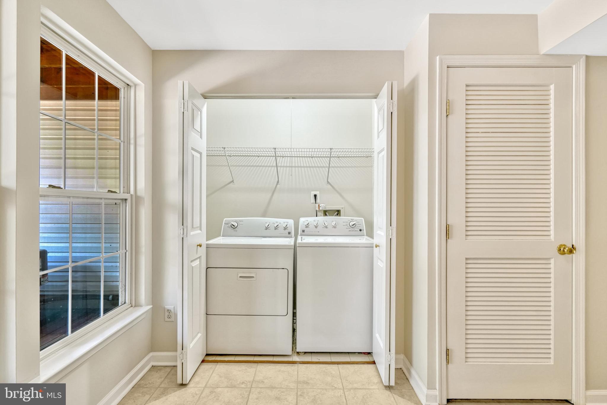 10159 Elgin Way Bristow, VA 20136 - Photo 12 of 50 a utility room with dryer and washer
