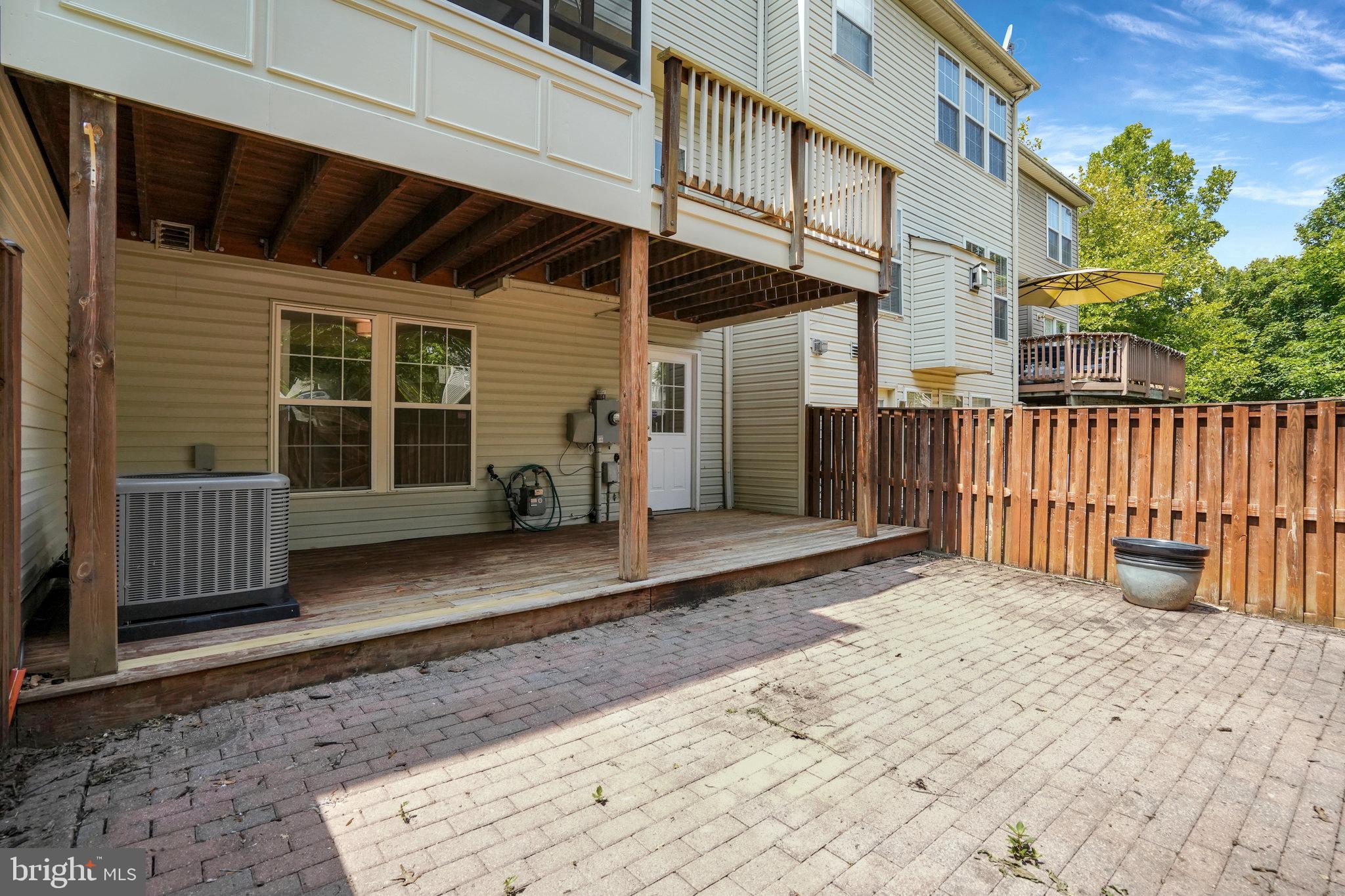 10159 Elgin Way Bristow, VA 20136 - Photo 16 of 50 a view of a house with wooden floor roof and furniture