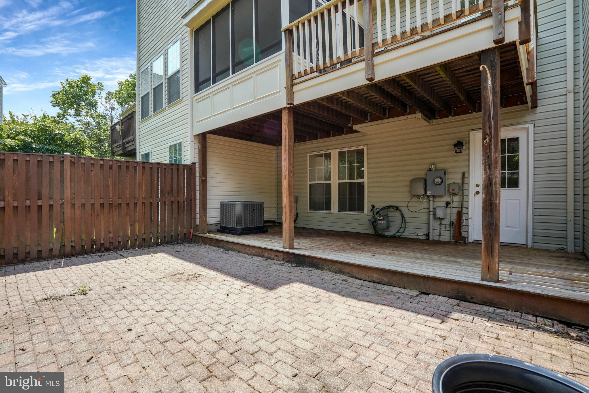 10159 Elgin Way Bristow, VA 20136 - Photo 17 of 50 a view of a house with a patio