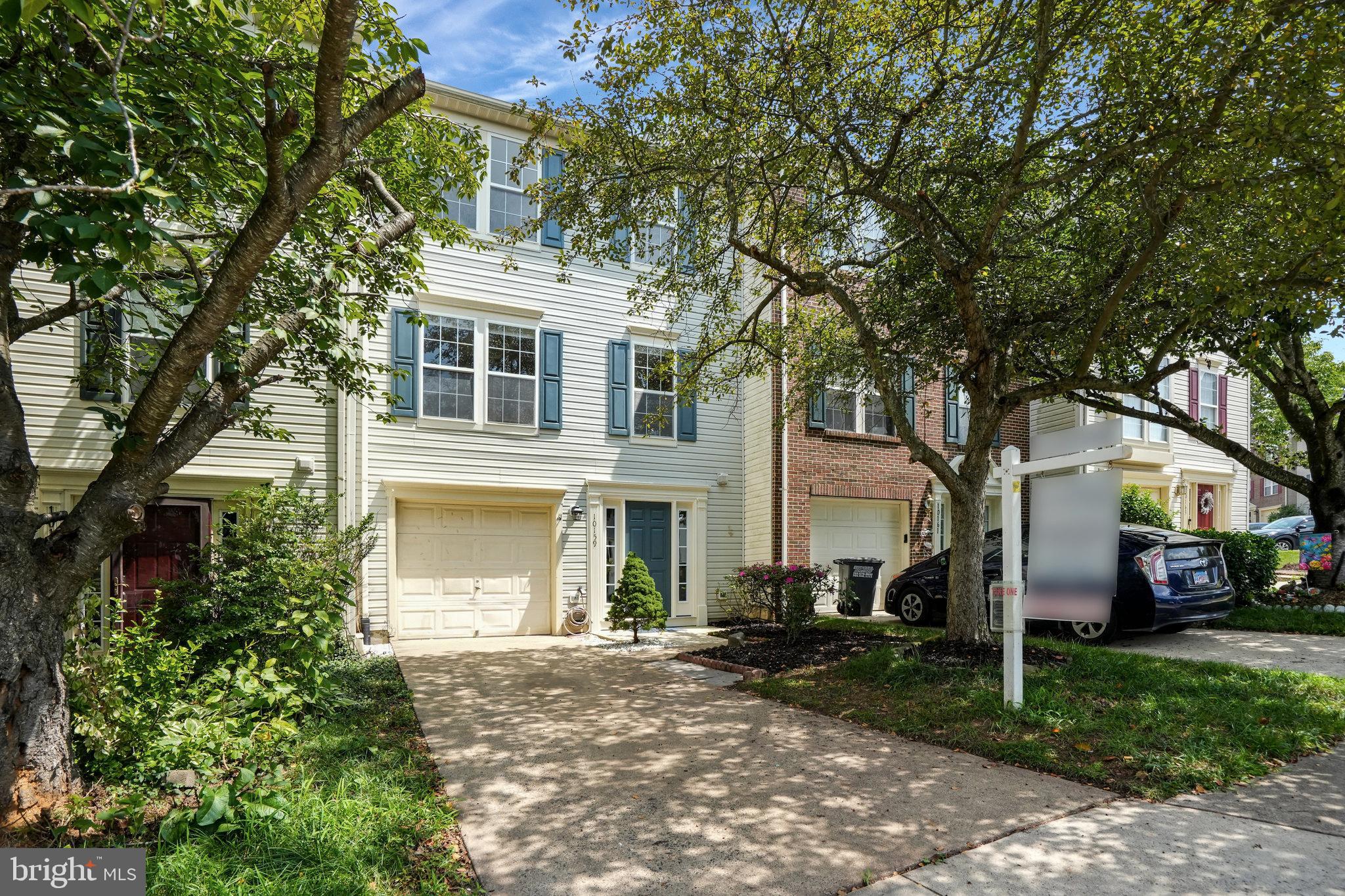 10159 Elgin Way Bristow, VA 20136 - Photo 2 of 50 front view of a house with a yard