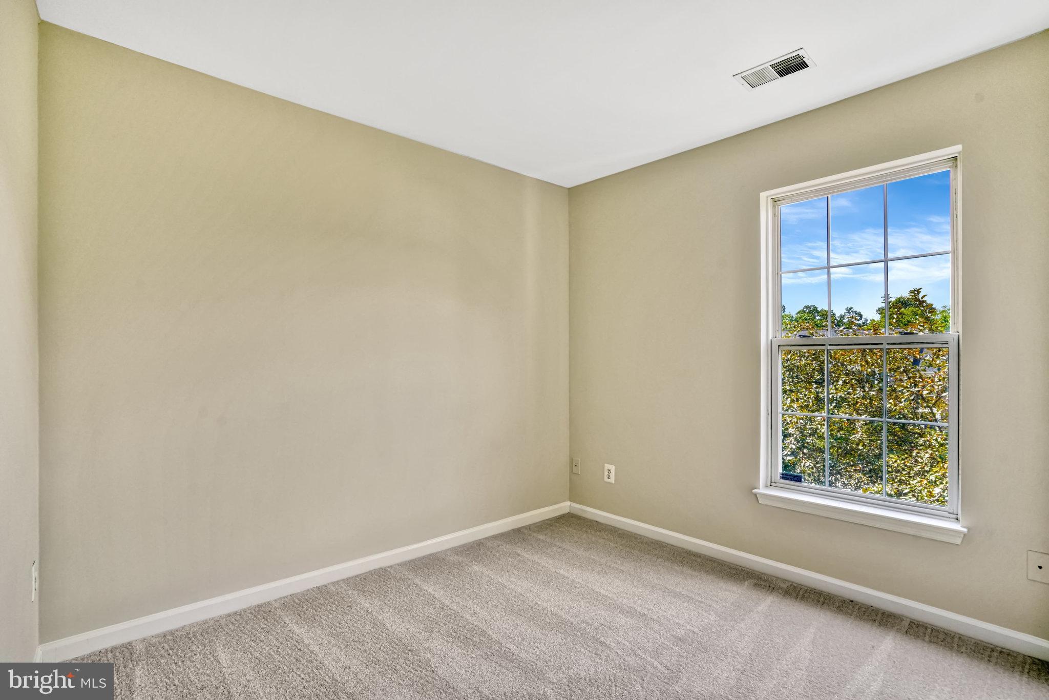 10159 Elgin Way Bristow, VA 20136 - Photo 30 of 50 an empty room with windows