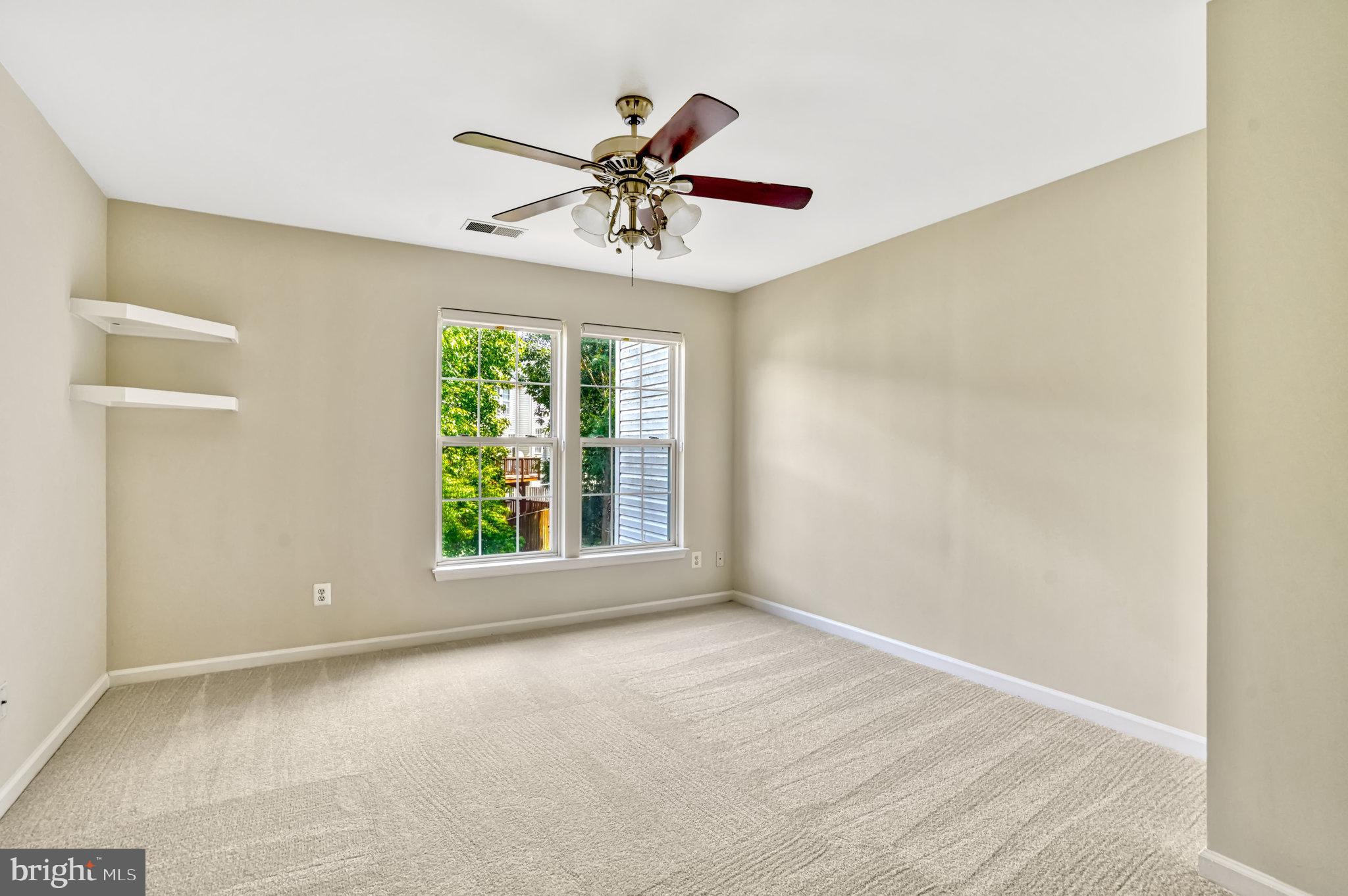10159 Elgin Way Bristow, VA 20136 - Photo 33 of 50 a view of an empty room with a window