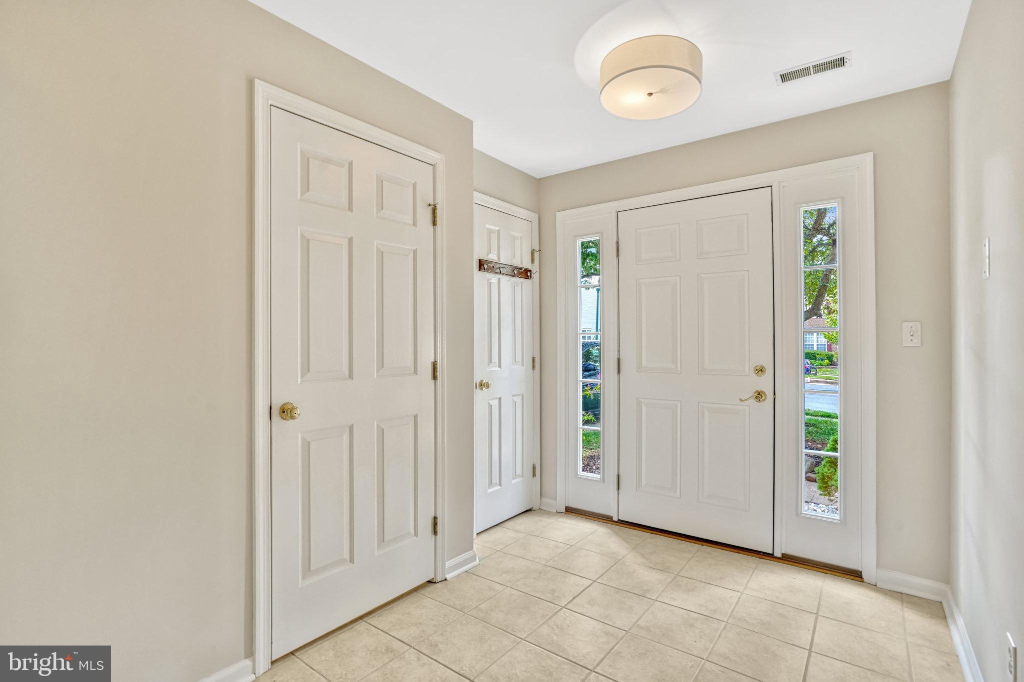 10159 Elgin Way Bristow, VA 20136 - Photo 4 of 50 a view of a room with front door