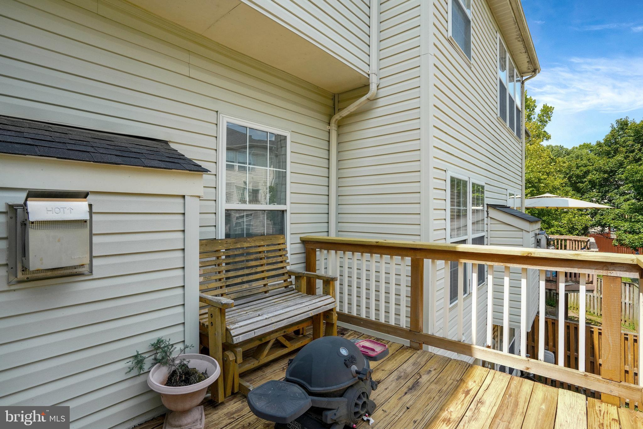10159 Elgin Way Bristow, VA 20136 - Photo 45 of 50 a view of a two chairs and table in the balcony
