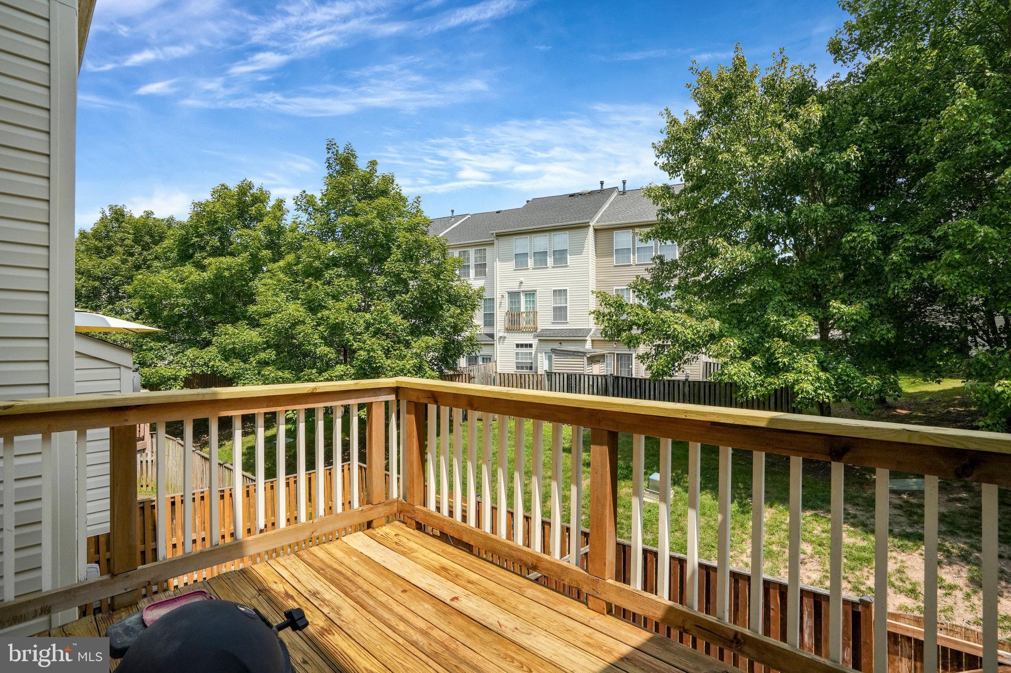 10159 Elgin Way Bristow, VA 20136 - Photo 46 of 50 a view of balcony with deck and wooden floor