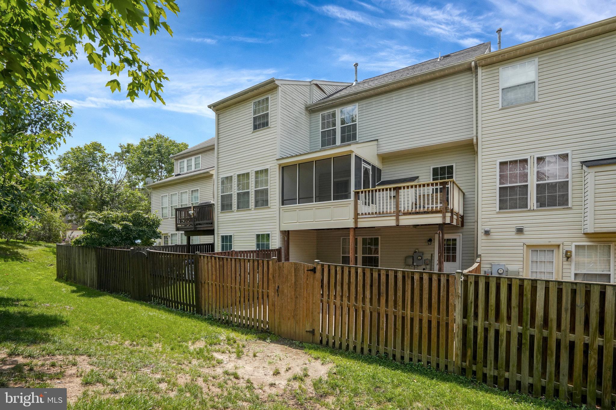 10159 Elgin Way Bristow, VA 20136 - Photo 50 of 50 a view of a house with wooden fence