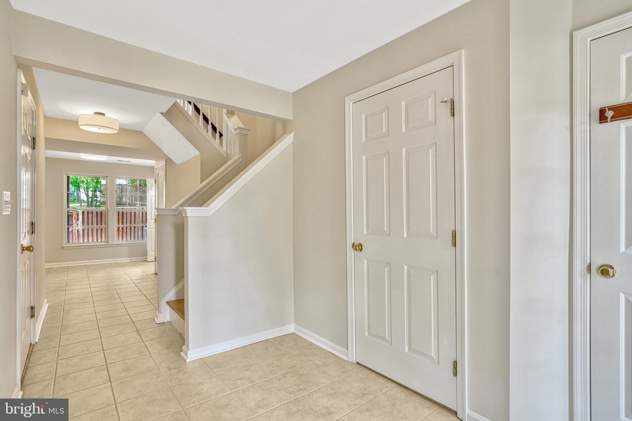 10159 Elgin Way Bristow, VA 20136 - Photo 5 of 50 a view of an entryway with wooden floor