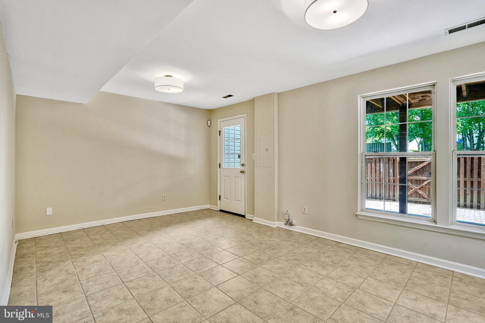 10159 Elgin Way Bristow, VA 20136 - Photo 8 of 50 a view of an empty room with a window