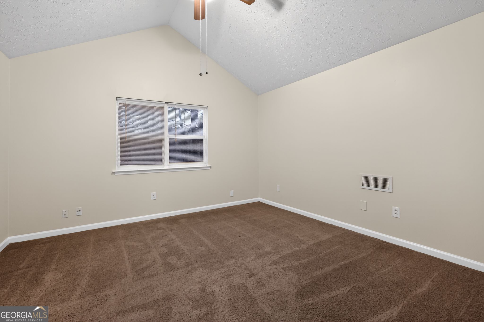 4586 High Gate Lane Lithonia, GA 30038 - Photo 19 of 33 an empty room with a window