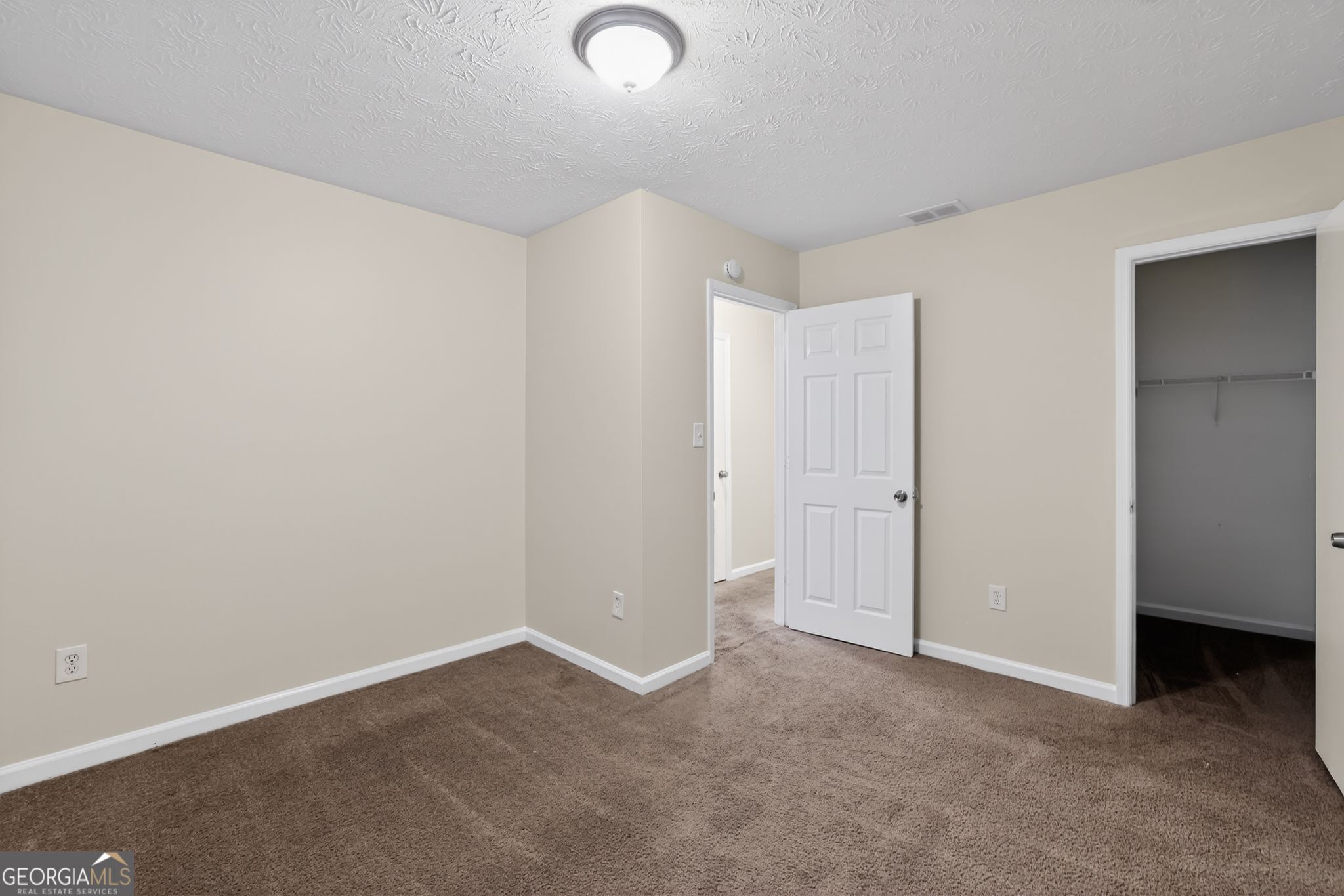 4586 High Gate Lane Lithonia, GA 30038 - Photo 22 of 33 an empty room with closet